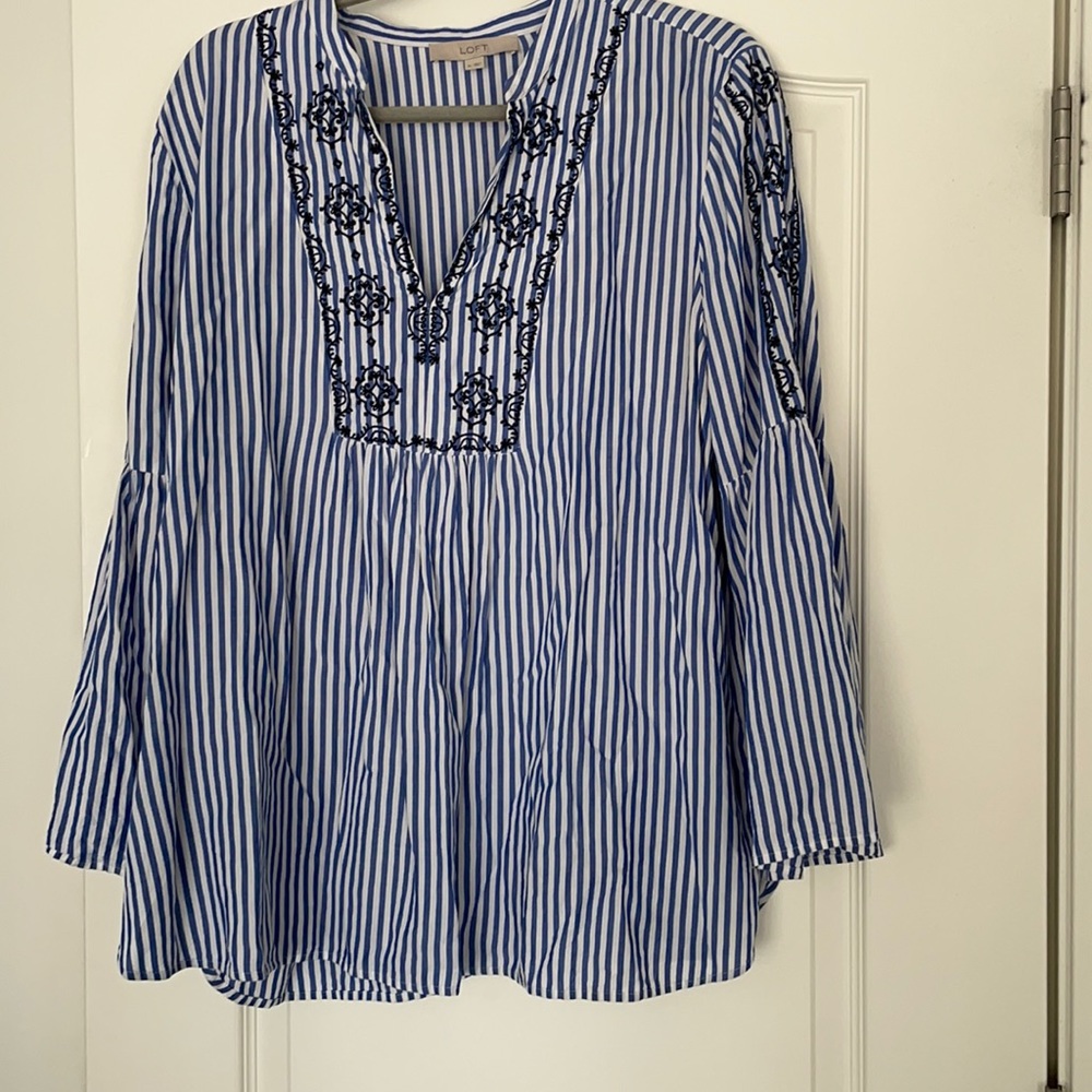 Bell sleeve top with detailing